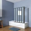 A modern bathroom with blue tiled walls, a white bathtub with a black framed glass shower screen, and a wooden stool with books. Produktbild-Vorschau