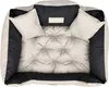 A top-down view of a pet bed. Voir les images du produit
