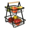 A two-tiered fruit basket filled with apples, pears, and grapes, set against a white background. Anteprima dell’immagine prodotto