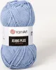 A ball of light blue yarn with a label. Podgląd zdjęcia produktu