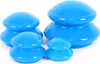 Four blue silicone suction cups of varying sizes are arranged on a white background.