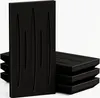 A stack of black acoustic foam panels with cut-out shapes. Podgląd zdjęcia produktu