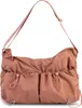 A studio shot of a handbag against a white background. Anteprima dell’immagine prodotto