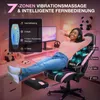 A woman is relaxing in a pink and black gaming chair with a footrest, in a room with pink lighting and panda decorations. Produktbild-Vorschau