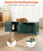 A cat is resting on top of a dark green cat cabinet, which has two open doors. There are inset circles showing close-ups of the material and construction. Voir les images du produit