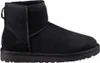 A black UGG boot is shown from the side against a white background. Voir les images du produit