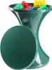 A dark green hourglass-shaped storage bin filled with colorful building blocks, with its lid placed next to it. Voir les images du produit