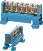 Two views of a blue terminal block with brass connectors and screws, mounted on a rail system. Produktbild-Vorschau