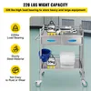 A stainless steel utility cart with two drawers, a bucket, and towels, with feature callouts. Produktbild-Vorschau