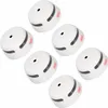 A group of white smoke detectors arranged diagonally on a white background. Produktbild-Vorschau