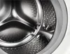 Close-up view of the inside of a washing machine drum. Produktbild-Vorschau