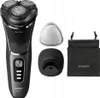 A Philips electric shaver and its accessories are displayed against a white background. Produktbild-Vorschau