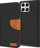 A black flip case for a smartphone is shown open, revealing the phone's camera module and the inside of the case. Produktbild-Vorschau