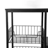 A close-up view of a black metal kitchen storage shelf with wire baskets. Voir les images du produit