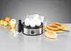 A tabletop scene with an egg cooker and breakfast items. Produktbild-Vorschau