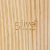 Close-up of a wooden surface with a logo and text embossed on it. Produktbild-Vorschau