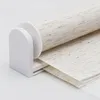 Close-up of a roller blind mechanism and fabric. Podgląd zdjęcia produktu