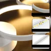 A close-up collage of a modern LED ceiling lamp with multiple rings, showing details of the light strip and the lamp's structure. Voir les images du produit