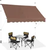A brown awning is set up over a small table and four chairs, suggesting an outdoor seating area. Podgląd zdjęcia produktu