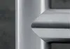 A close-up view of a brushed stainless steel faucet with a pull-out spout. Produktbild-Vorschau