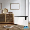 A modern living room with a heater, cabinet, and coffee table. Voir les images du produit