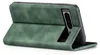 A green flip case for a smartphone, shown from the side with the front cover open. Produktbild-Vorschau