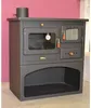 A dark gray wood-burning stove with a glass oven door and a small storage compartment below. Anteprima dell’immagine prodotto