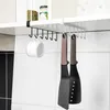 Kitchen cabinet shelf with hanging organizers for mugs and utensils. Produktbild-Vorschau
