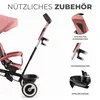 A close-up view of a pink tricycle, highlighting its accessories and features. Náhled obrázku produktu