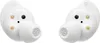 A pair of white wireless earbuds are shown against a white background. Voir les images du produit
