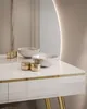 Close-up of a vanity table with decorative bowls and containers. Produktbild-Vorschau