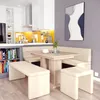 A dining set in a modern kitchen with a yellow backsplash. Produktbild-Vorschau