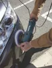 A person is using a Makita polisher on the side of a car. Podgląd zdjęcia produktu