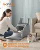 A woman is cleaning a cat litter box while a cat watches. Produktbild-Vorschau