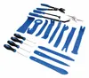 A collection of blue and black automotive trim removal tools laid out on a white background. Anteprima dell’immagine prodotto