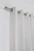 A close-up view of a white curtain hanging from a silver curtain rod. Produktbild-Vorschau