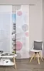 A room interior with a sliding panel curtain, a coffee table, and a chair. Produktbild-Vorschau