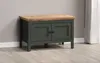 A dark green cabinet with a wooden top sits on a light wooden floor against a light gray wall. Anteprima dell’immagine prodotto