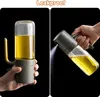 A split image showing an oil sprayer. The left side shows the sprayer held in a hand, and the right side shows a hand spraying oil from the sprayer. Produktbild-Vorschau