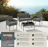 A rattan garden furniture set is displayed on a patio with a view of the ocean and palm trees. Produktbild-Vorschau