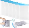 A set of vacuum seal bags for clothing, with a demonstration of how they are used. Produktbild-Vorschau