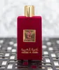 A close-up shot of a red velvet perfume bottle with a gold cap and gold label. Náhled obrázku produktu