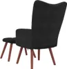 A black velvet armchair with a matching ottoman, viewed from the back and side, on a white background. Produktbild-Vorschau