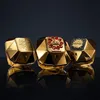 Three Paco Rabanne Lady Million Royal Eau de Parfum bottles are displayed on a reflective black surface against a dark background. Voir les images du produit