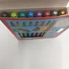 A box of metallic markers with colorful caps. Voir les images du produit