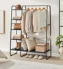 A clothing rack with clothes, bags, shoes, and pillows. Produktbild-Vorschau