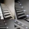 A collage of images showing a modern staircase with integrated LED lighting. Produktbild-Vorschau