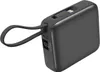 A dark gray power bank with a digital display showing 100% charge, a built-in Lightning cable, and a fabric loop attached. Produktbild-Vorschau