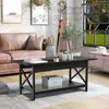 A living room scene with a brown leather sofa, a black coffee table, and decorative items. Náhľad obrázku produktu
