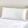 A white pillow on a bed. Produktbild-Vorschau